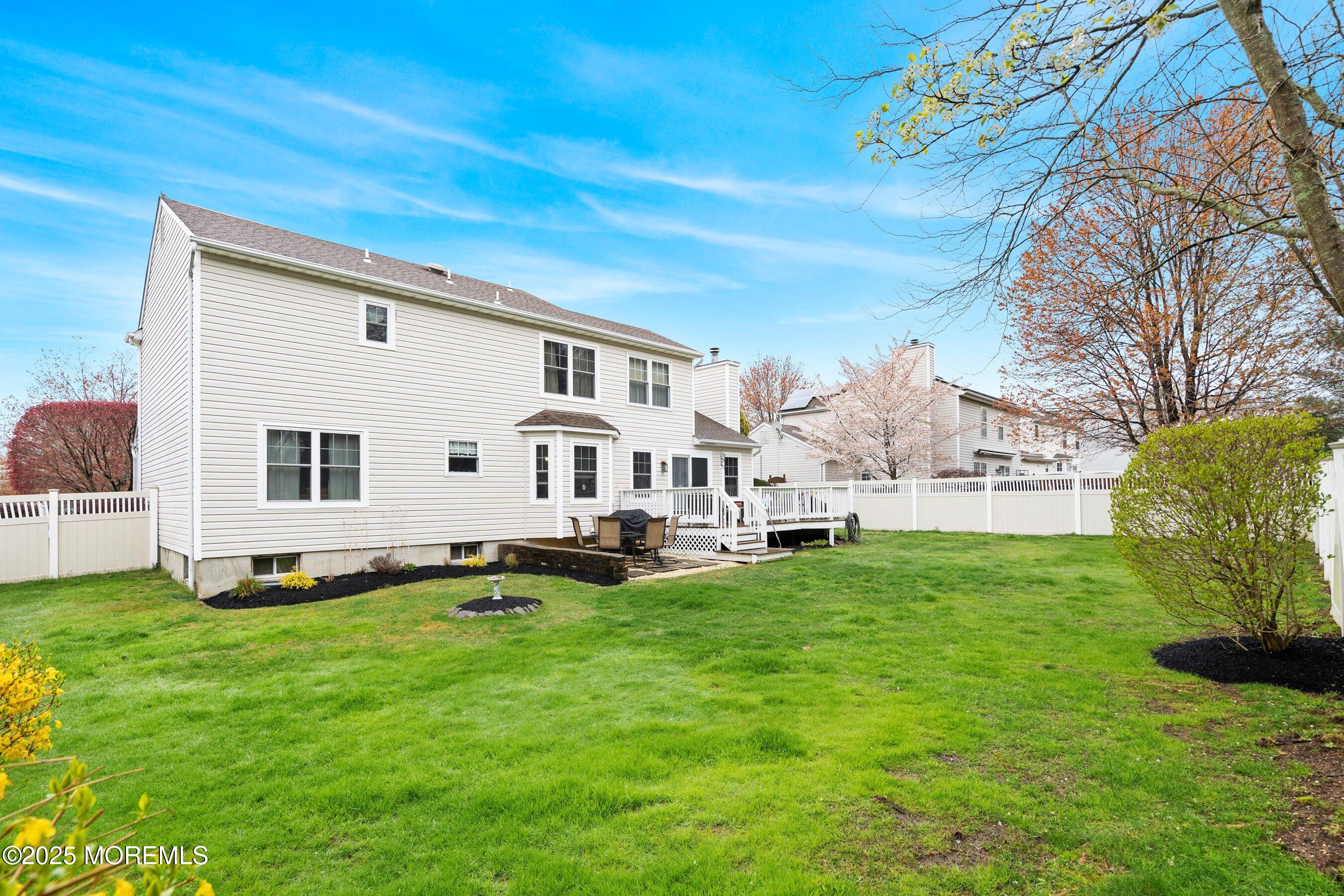 47 Crater Lake Road Howell, NJ 07731 - Photo 35 of 40 a view of a house with a yard