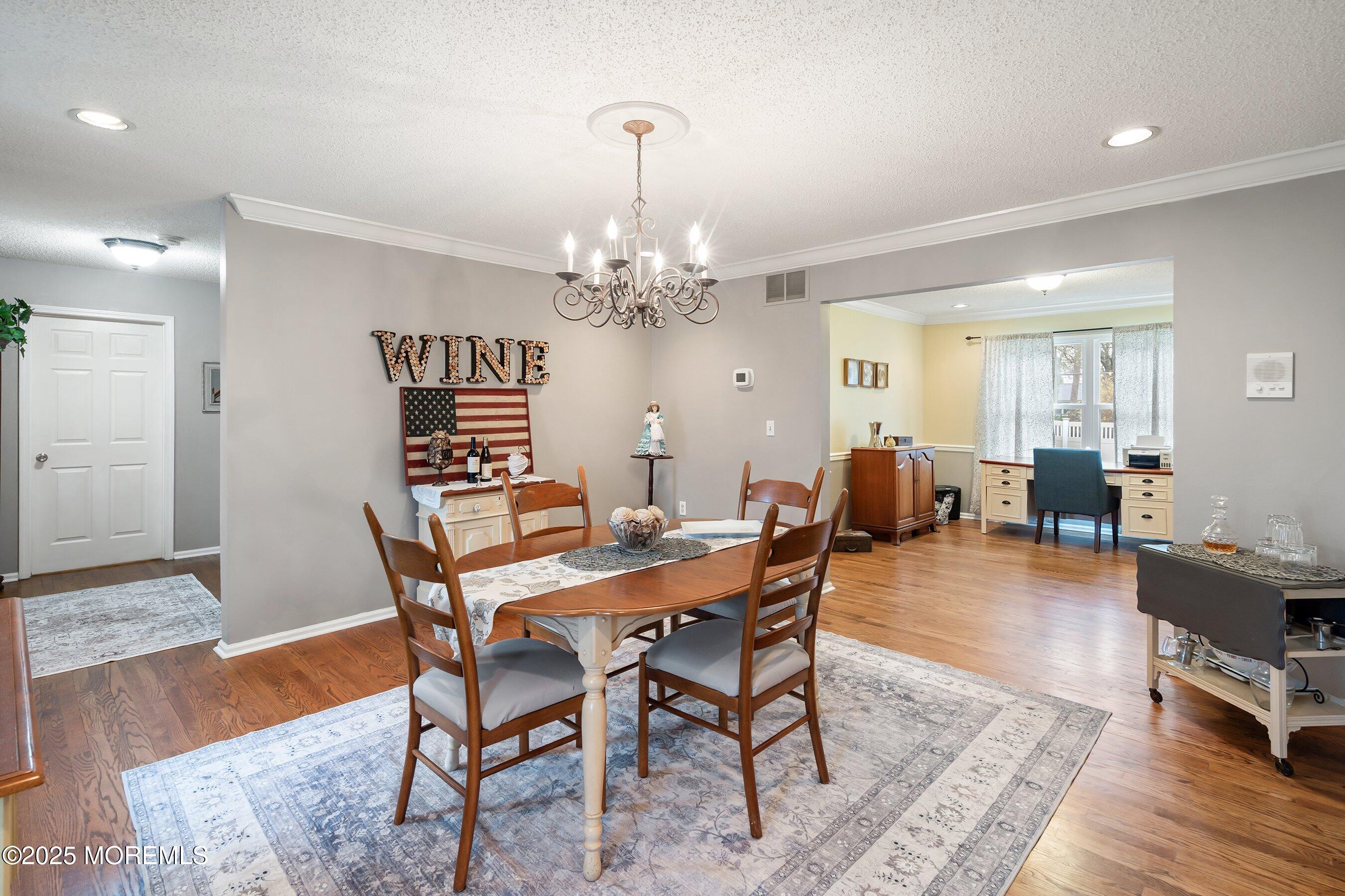 47 Crater Lake Road Howell, NJ 07731 - Photo 7 of 40 a view of a dining room with furniture
