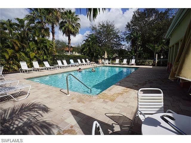 900 Diamond Circle, Unit 908 Naples, FL 34110 - Photo 19 of 22 a view of outdoor space and yard