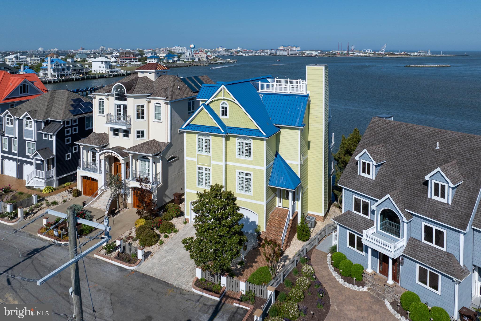 12959 Harbor Road Ocean City, MD 21842 - Photo 67 of 85 a front view of a multi story building