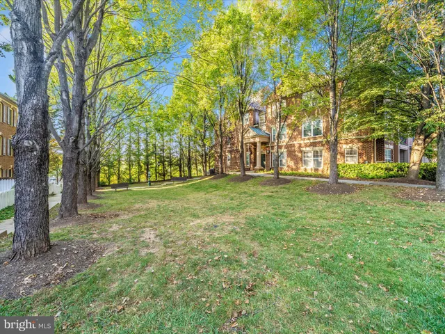 front view of a building with a yard