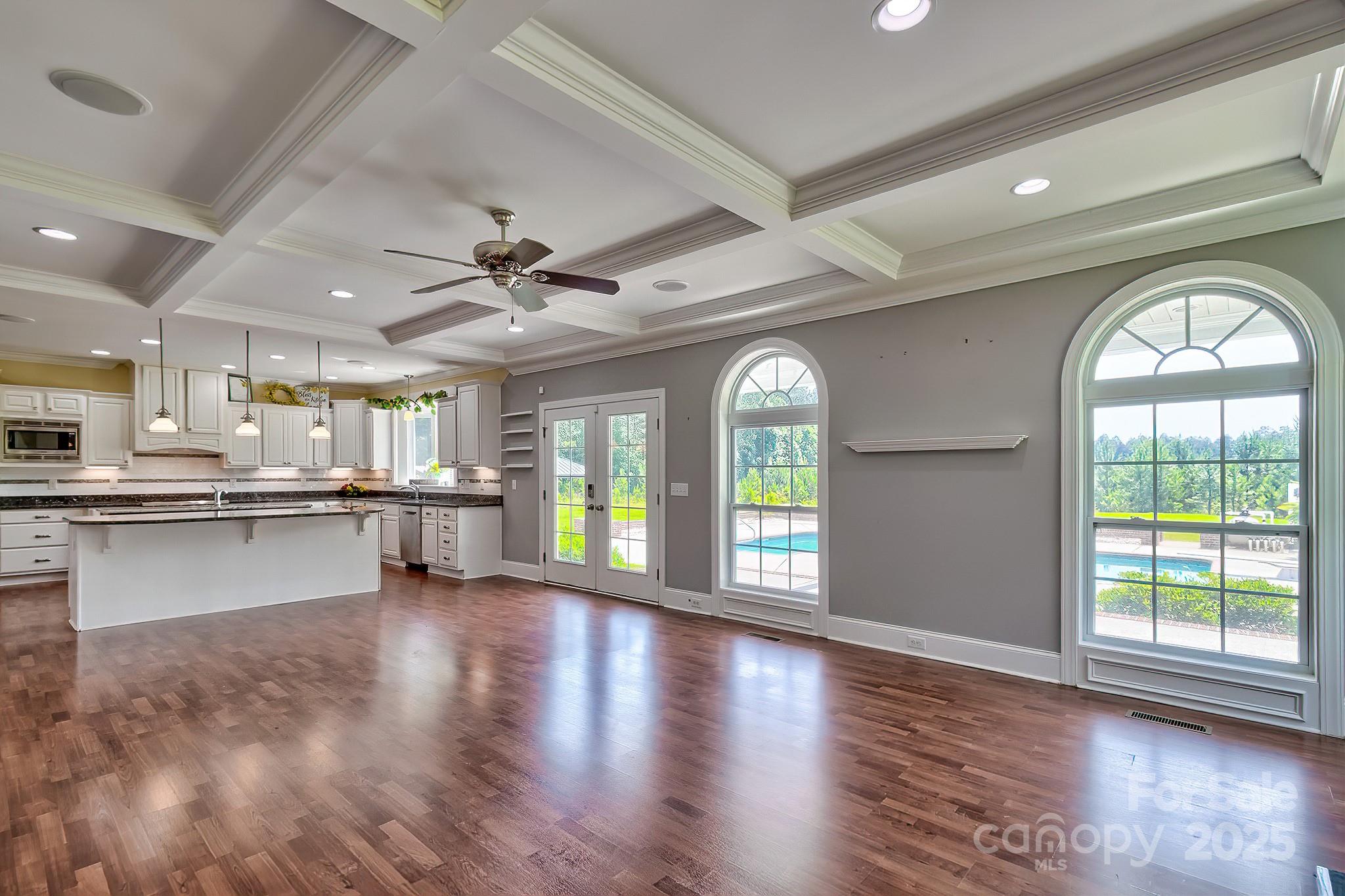 6268 Hope Road Winnsboro, SC 29180 - Photo 19 of 48 a view of an empty room with window and wooden floor