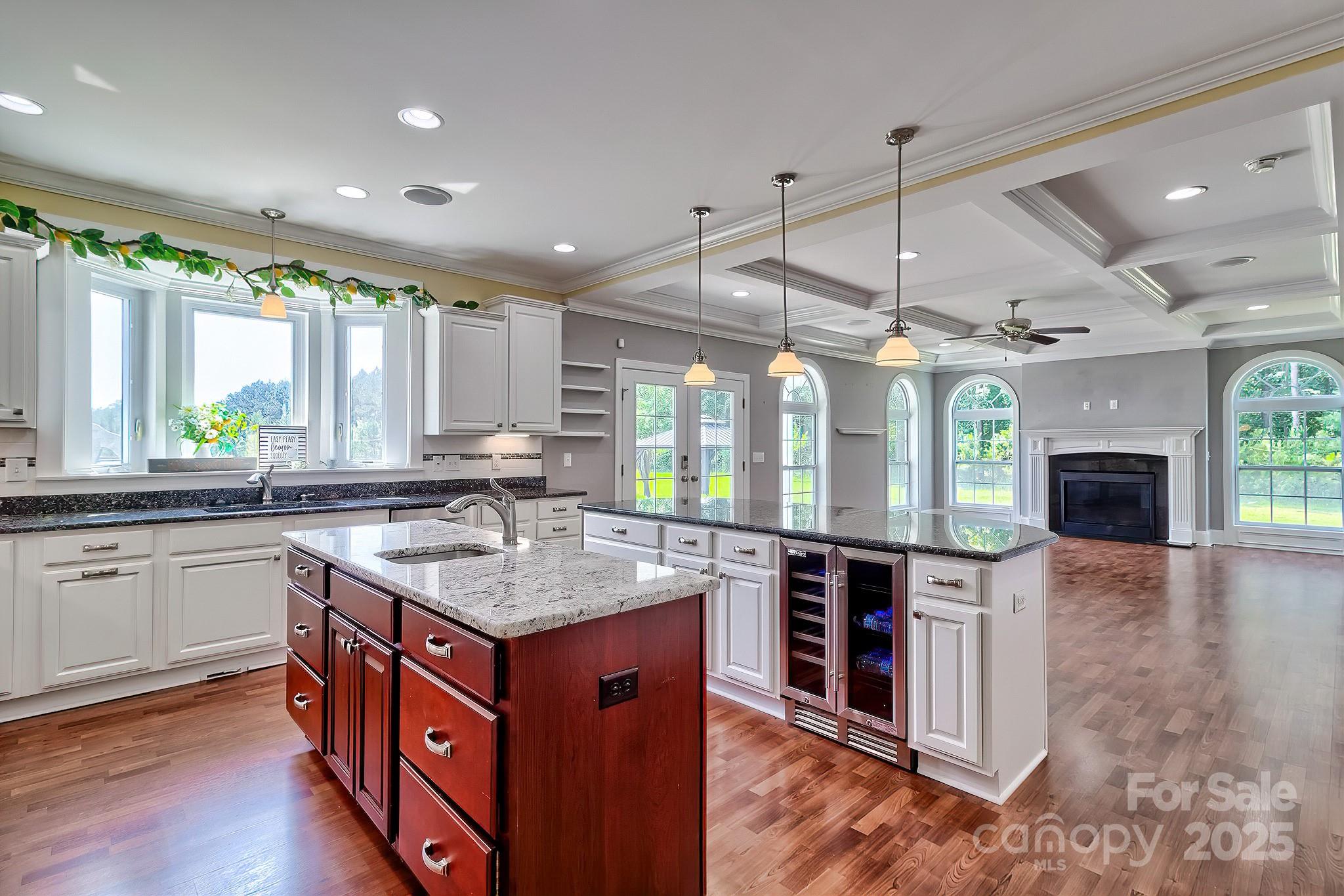 6268 Hope Road Winnsboro, SC 29180 - Photo 24 of 48 a kitchen with stainless steel appliances granite countertop a stove a sink and a refrigerator