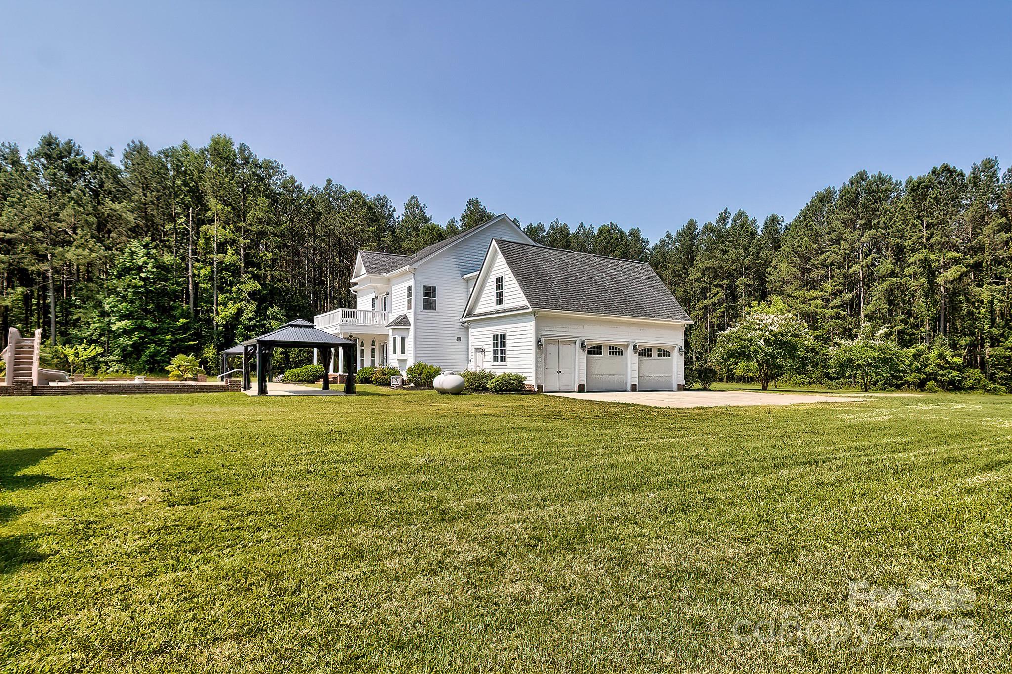 6268 Hope Road Winnsboro, SC 29180 - Photo 3 of 48 a house view with a garden space