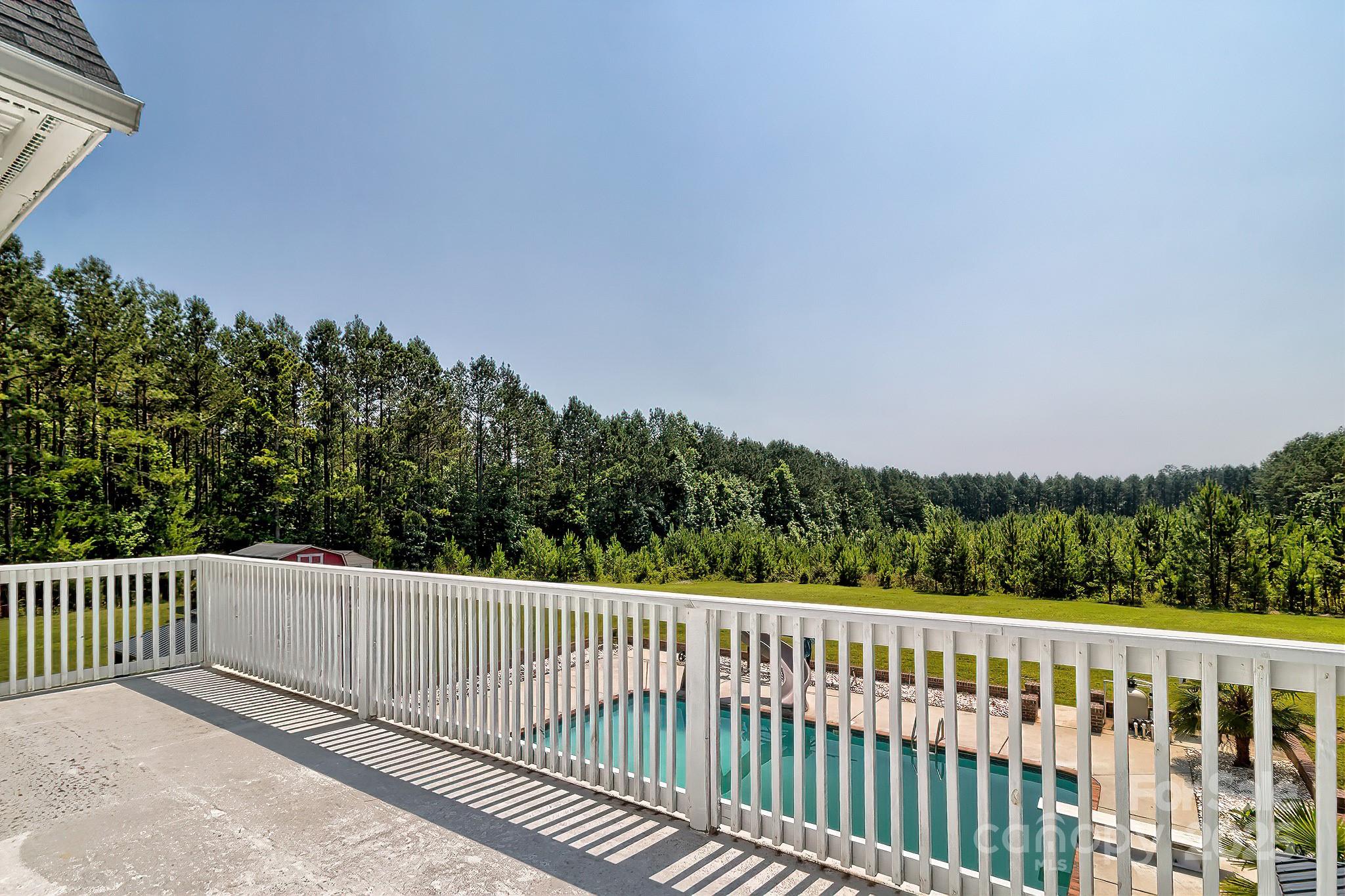 6268 Hope Road Winnsboro, SC 29180 - Photo 39 of 48 a balcony with wooden floor and fence