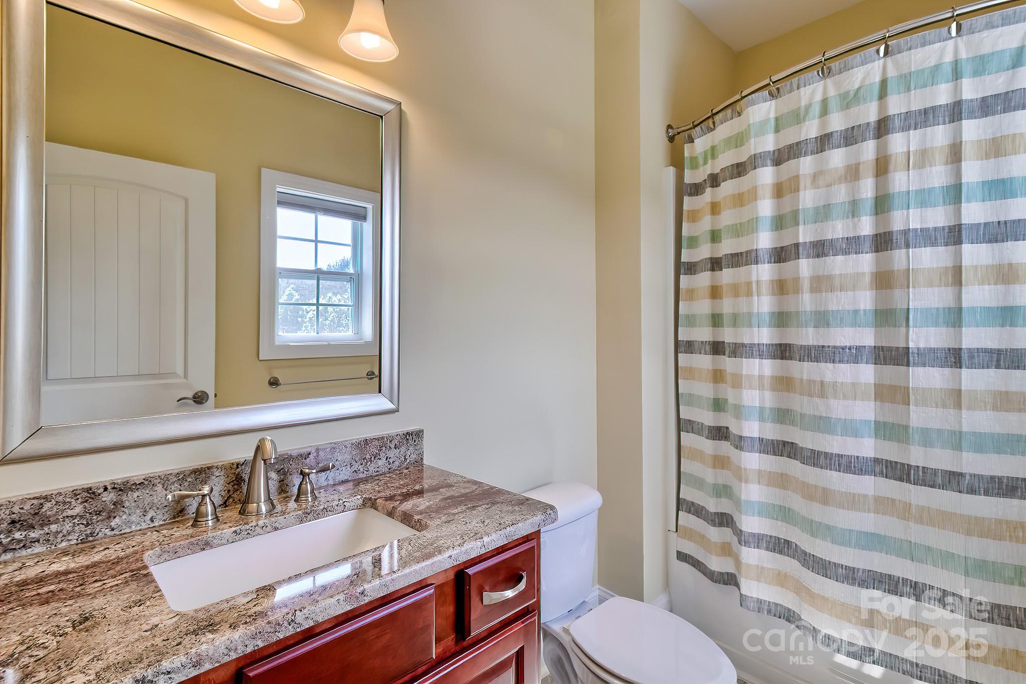 6268 Hope Road Winnsboro, SC 29180 - Photo 44 of 48 a bathroom with a sink toilet and shower