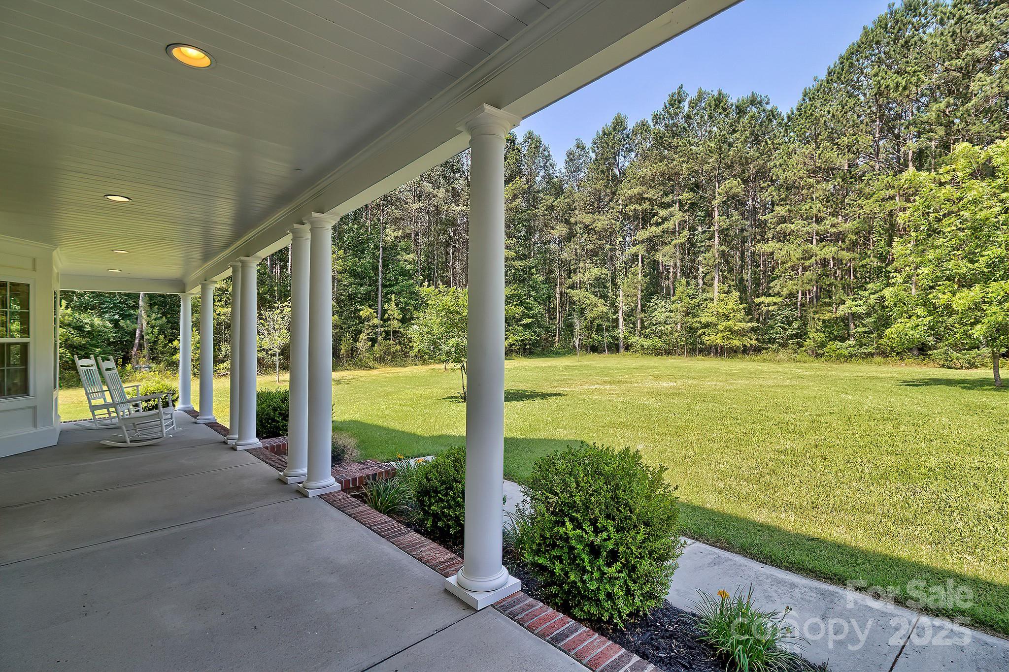 6268 Hope Road Winnsboro, SC 29180 - Photo 6 of 48 a view of a building from a yard