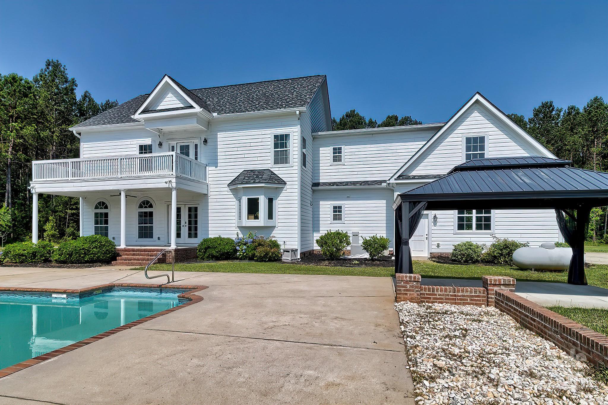 6268 Hope Road Winnsboro, SC 29180 - Photo 7 of 48 a front view of a house with a yard