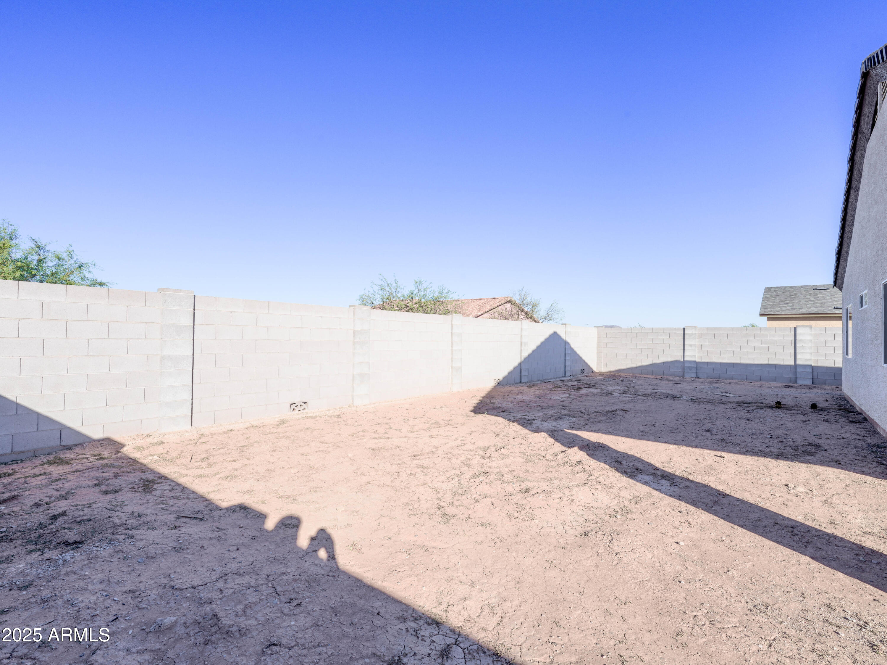 14534 South Diablo Road Arizona City, AZ 85123 - Photo 25 of 36 a view of a backyard of the house