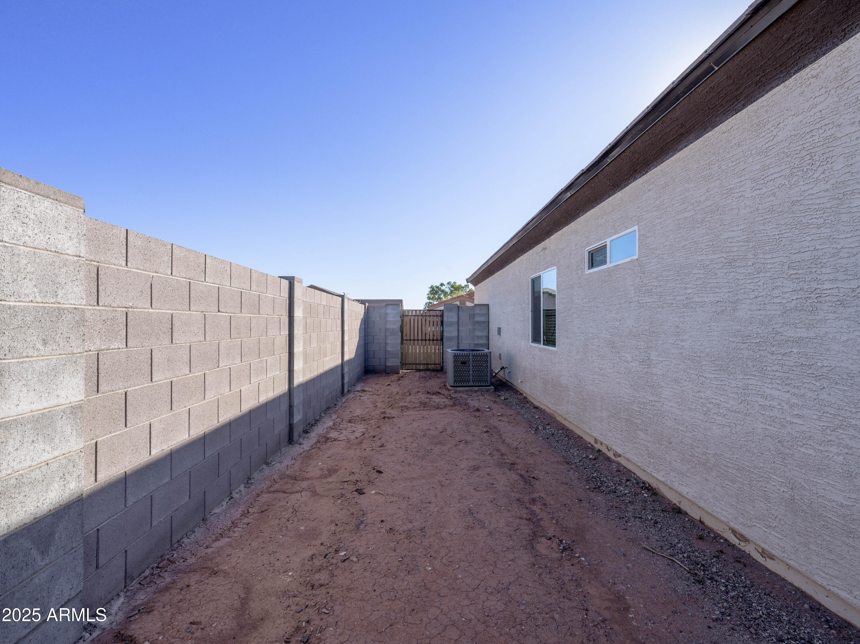 14534 South Diablo Road Arizona City, AZ 85123 - Photo 28 of 36 a view of a back yard of the house