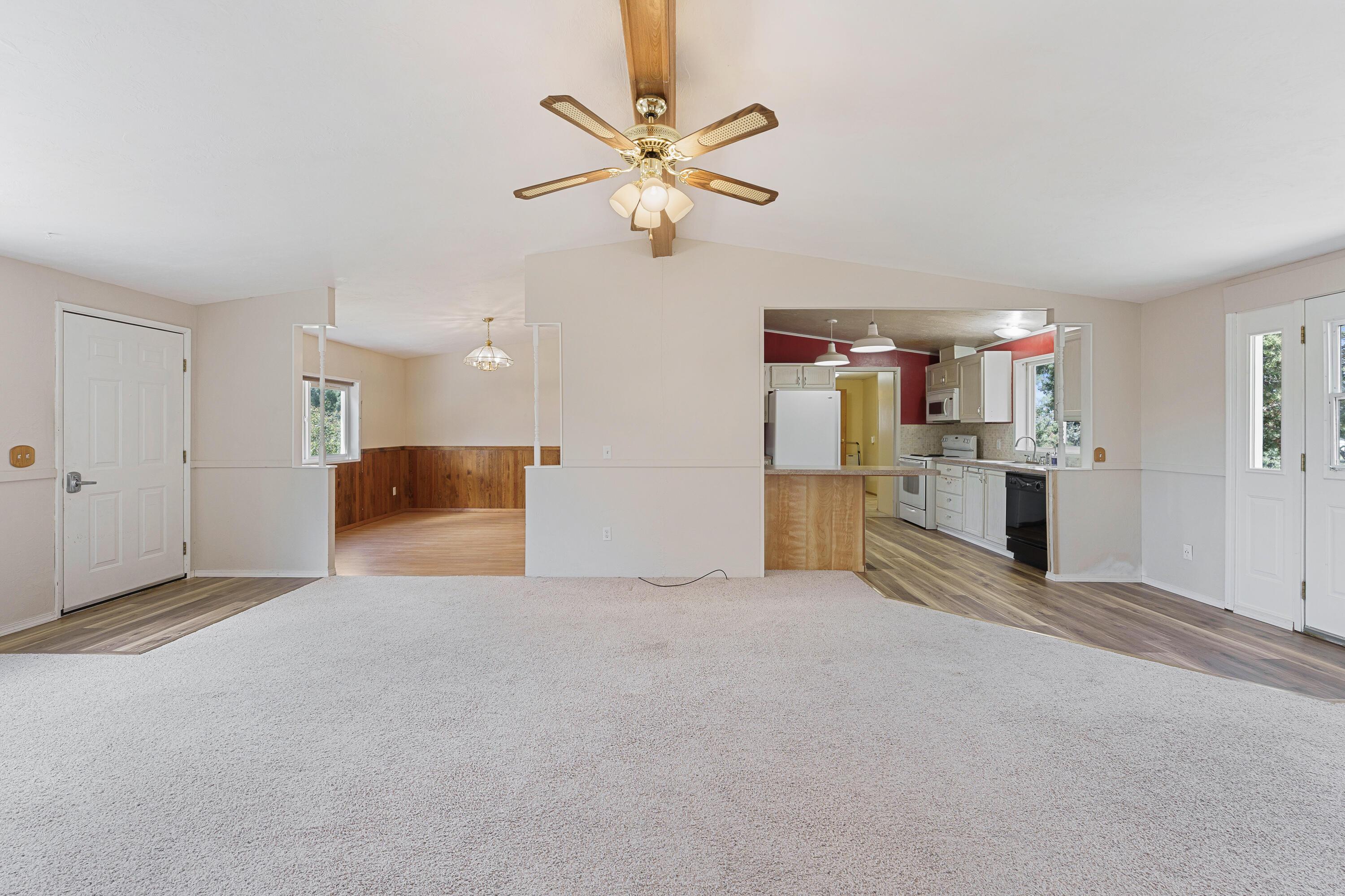 5674 Southeast Davis Loop Prineville, OR 97754 - Photo 9 of 48 a view of a kitchen with furniture and a ceiling fan