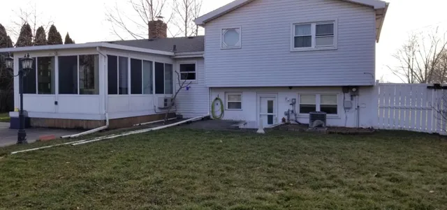 a house view with a garden space