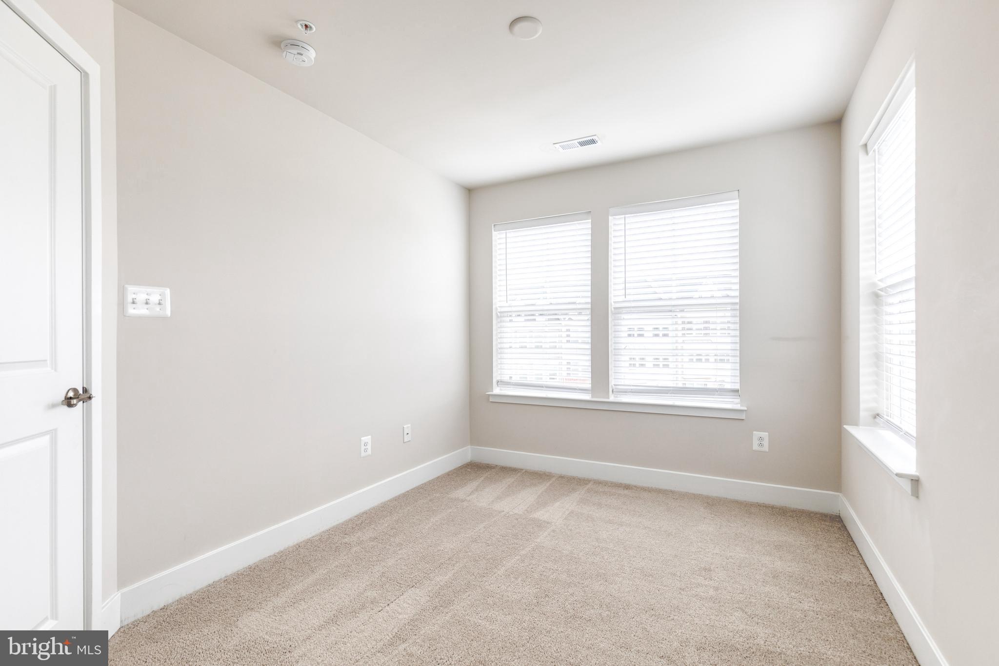 2008 Ivory Brook Road Baltimore, MD 21244 - Photo 26 of 35 an empty room with a window