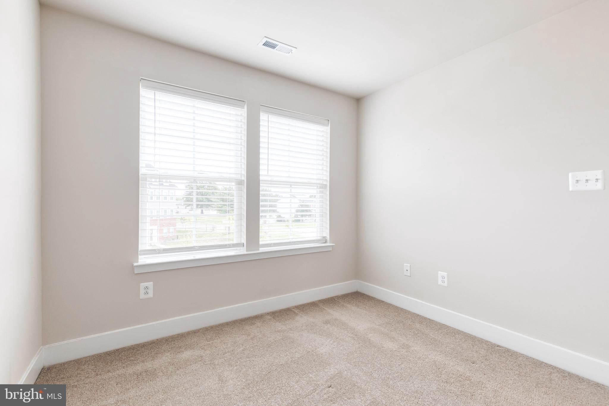 2008 Ivory Brook Road Baltimore, MD 21244 - Photo 27 of 35 an empty room with a window