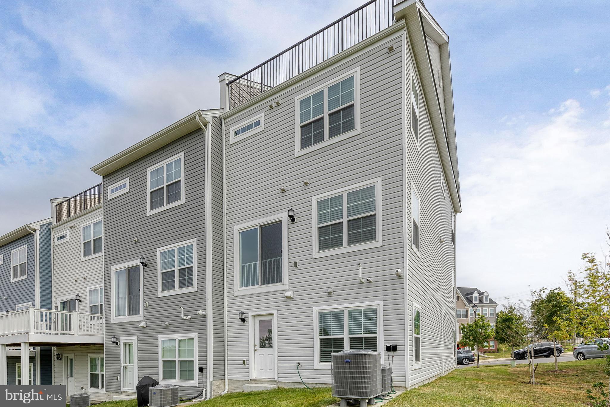 2008 Ivory Brook Road Baltimore, MD 21244 - Photo 35 of 35 a front view of a building with garden