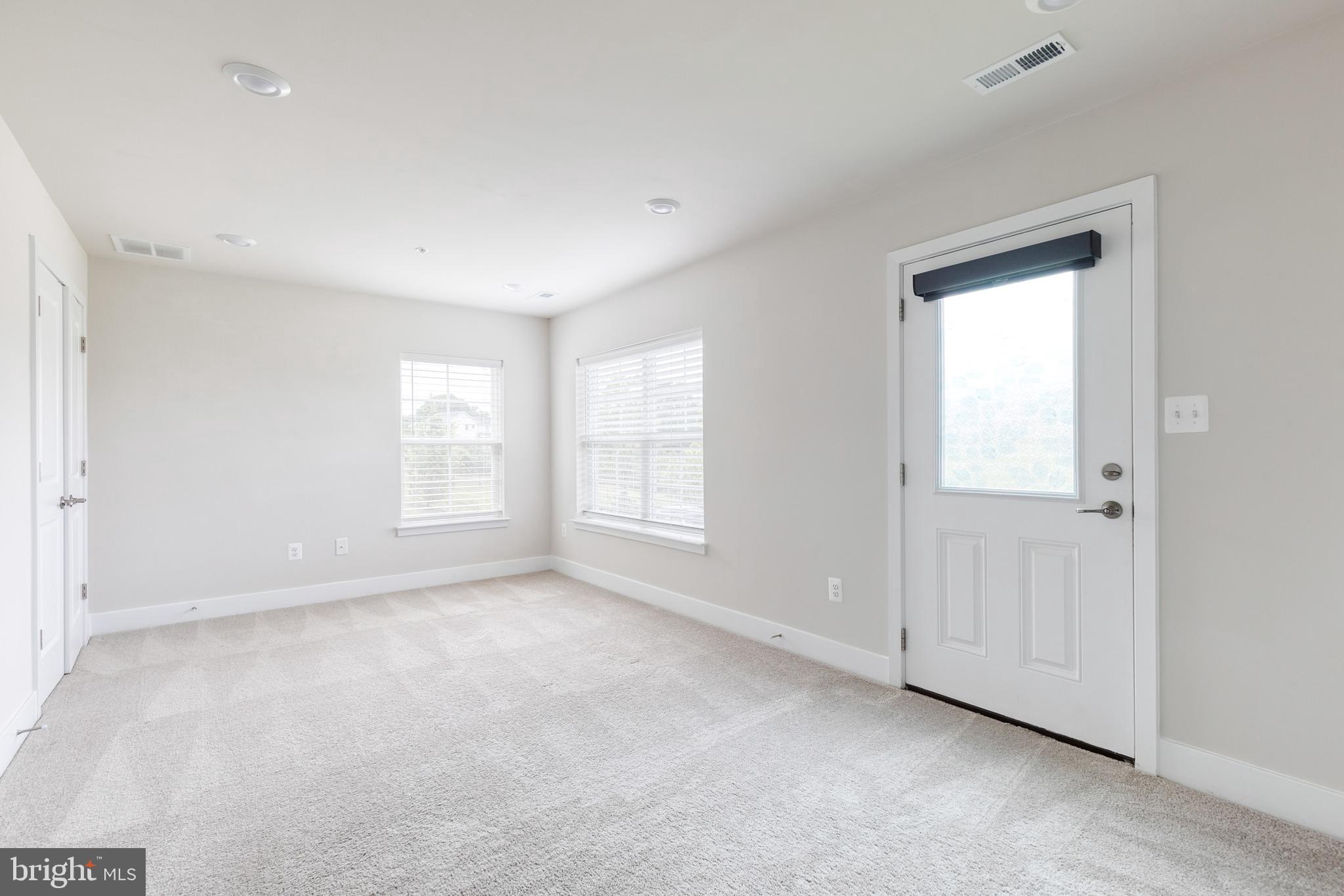 2008 Ivory Brook Road Baltimore, MD 21244 - Photo 4 of 35 a view of an empty room with a window