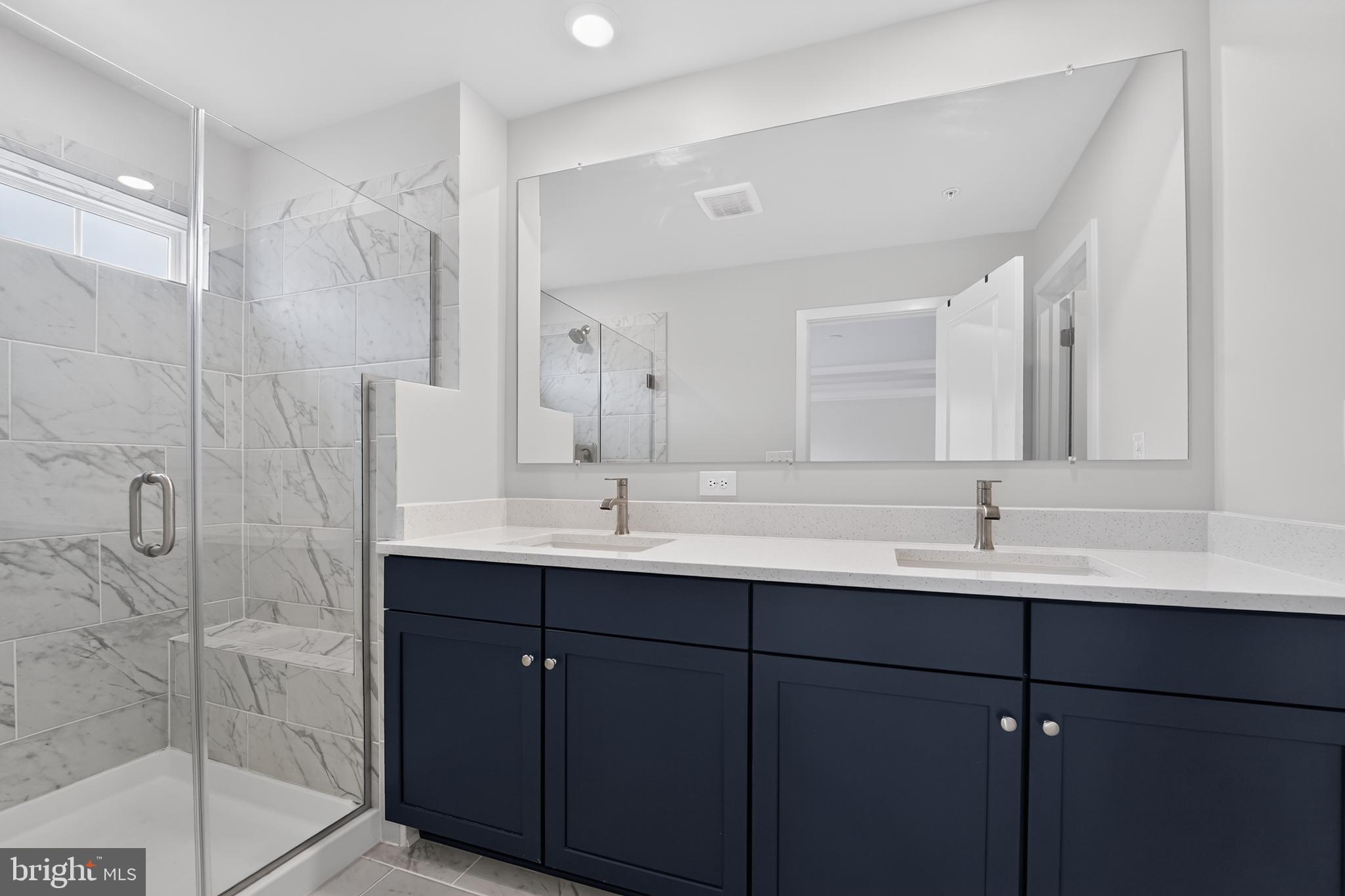 1808 Parham Way Baltimore, MD 21244 - Photo 21 of 31 Sleek modern bathroom with elegant finishes.