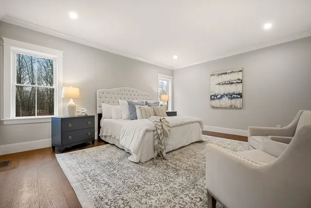 a bed room with a bed and a couch