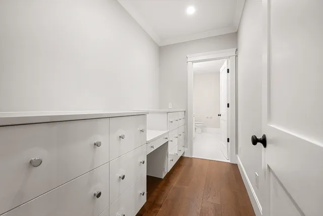 a bathroom with a double vanity sink and mirror