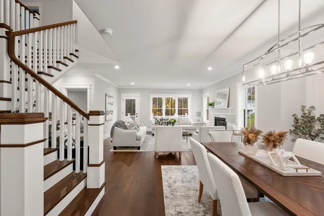 a view of a living room and wooden floor
