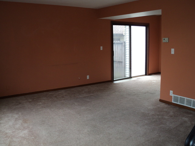 623 Northgate Road, Unit 623 New Lenox, IL 60451 - Photo 4 of 9 a view of an empty room with a window