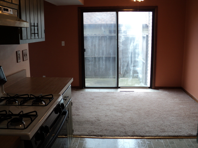 623 Northgate Road, Unit 623 New Lenox, IL 60451 - Photo 5 of 9 a view of a livingroom with wooden floor