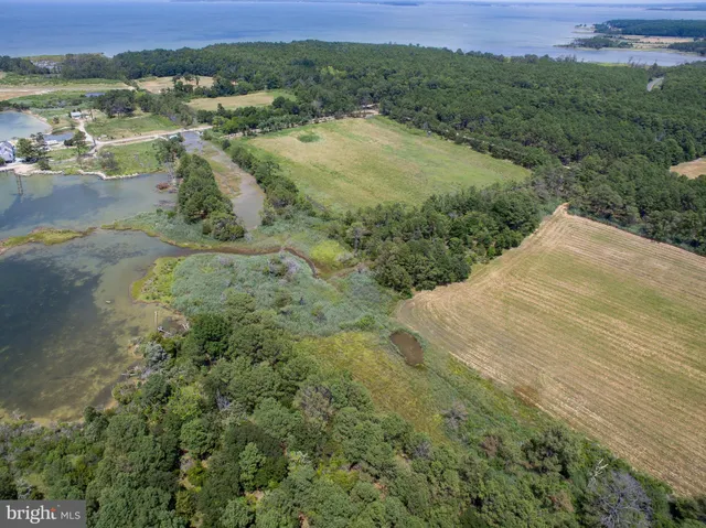 an aerial view of mountain with lake view