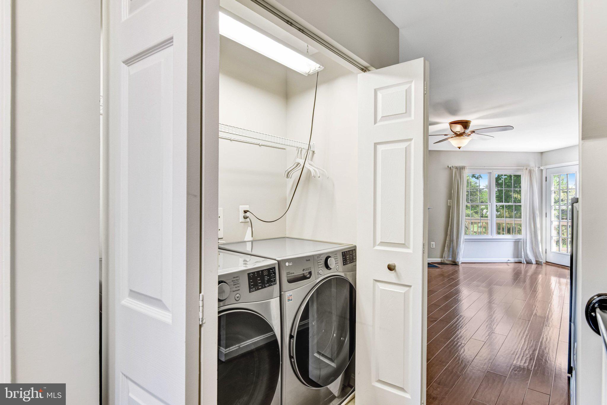 22142 Trailside Square Sterling, VA 20164 - Photo 15 of 32 a view of a storage & utility room with wooden floor
