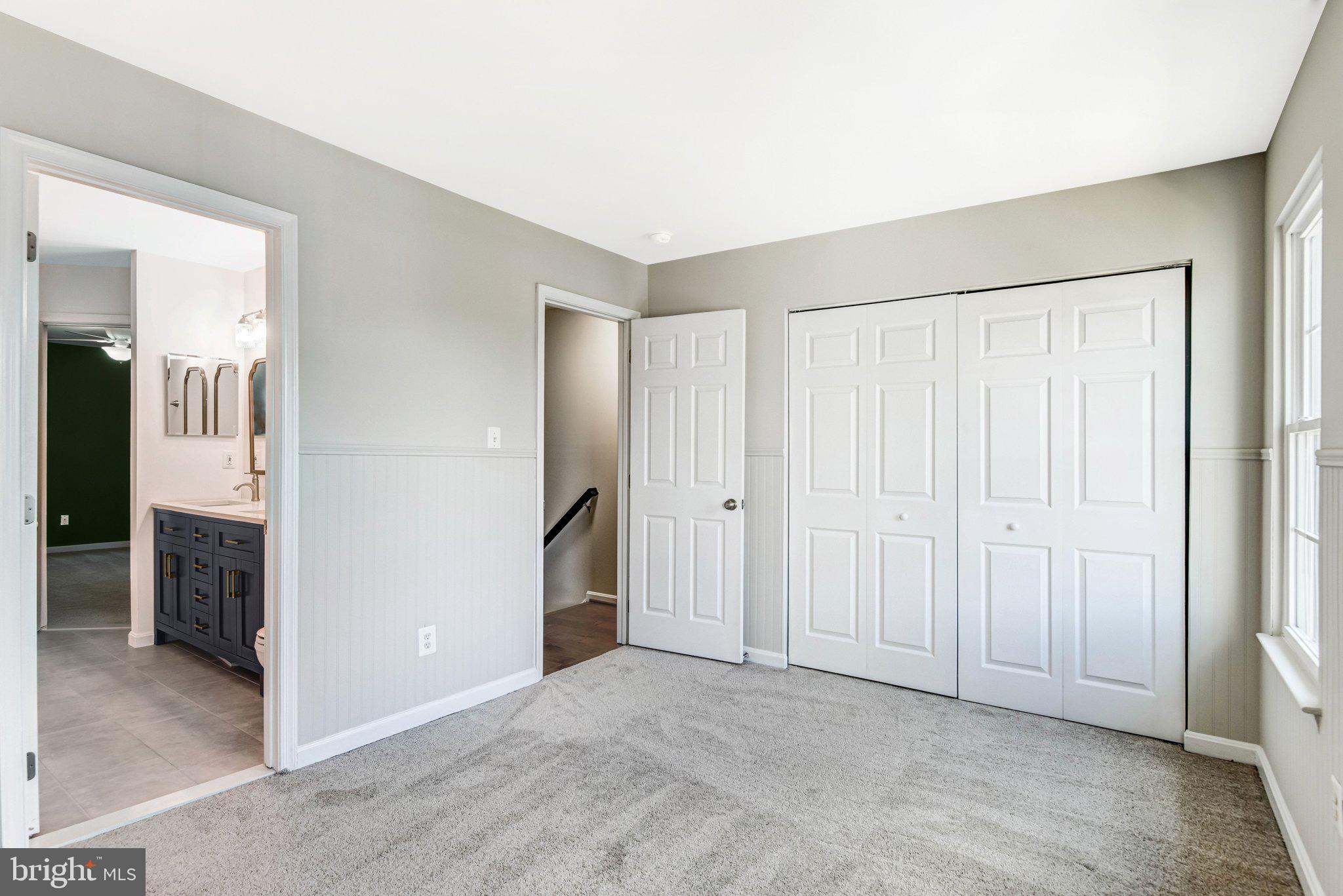 22142 Trailside Square Sterling, VA 20164 - Photo 21 of 32 an empty room with a bathroom