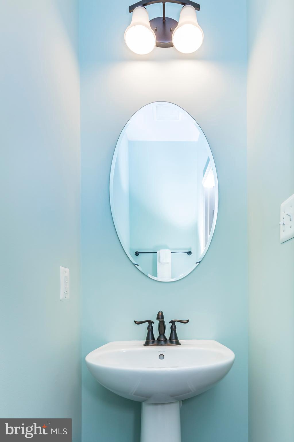 9511 Watts Road Owings Mills, MD 21117 - Photo 24 of 48 Upper level hall powder room