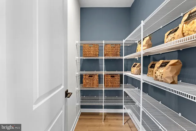 a view of an empty room with stairs