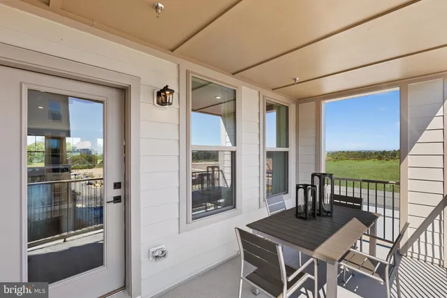 a room with furniture and a window