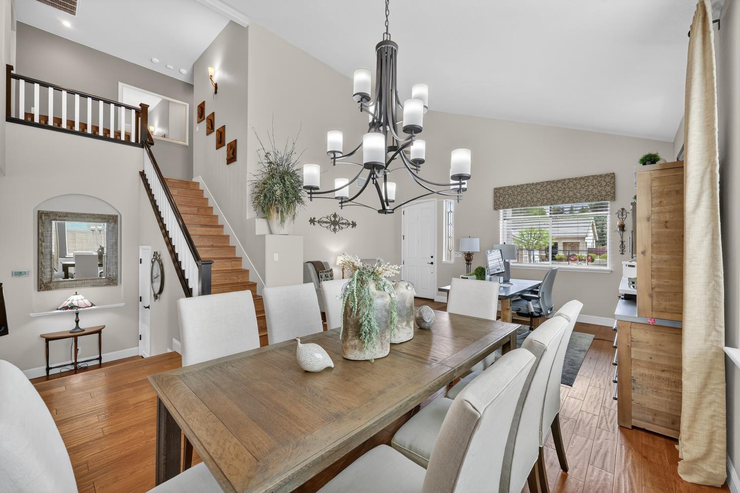 1203 Halidon Way Folsom, CA 95630 - Photo 12 of 98 a view of a dining room with furniture and a chandelier