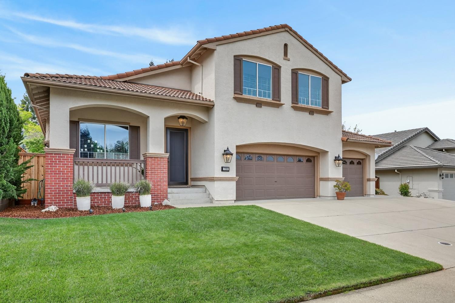 1203 Halidon Way Folsom, CA 95630 - Photo 3 of 98 a front view of a house with garden