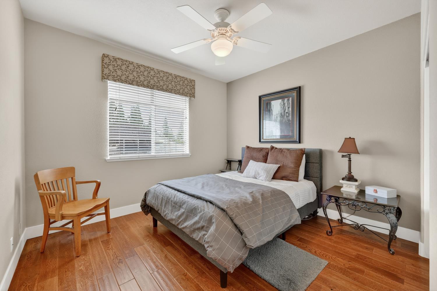 1203 Halidon Way Folsom, CA 95630 - Photo 46 of 98 a bedroom with a bed and chair