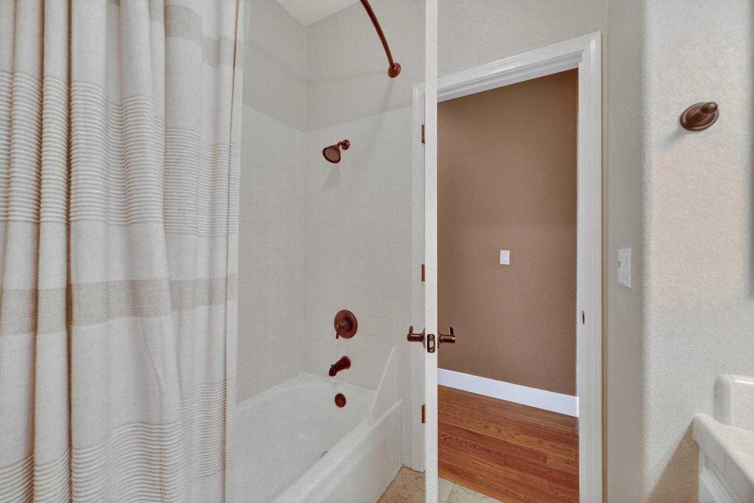 1203 Halidon Way Folsom, CA 95630 - Photo 53 of 98 a bathroom with a bathtub and shower