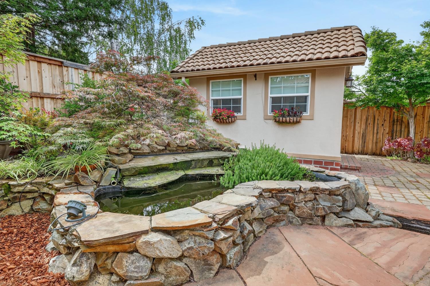 1203 Halidon Way Folsom, CA 95630 - Photo 68 of 98 a front view of a house with a yard