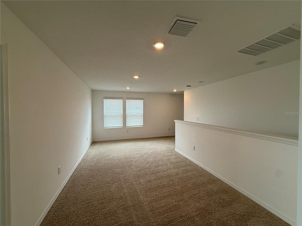 6431 Milestone Loop Palmetto, FL 34221 - Photo 18 of 28 a view of empty room