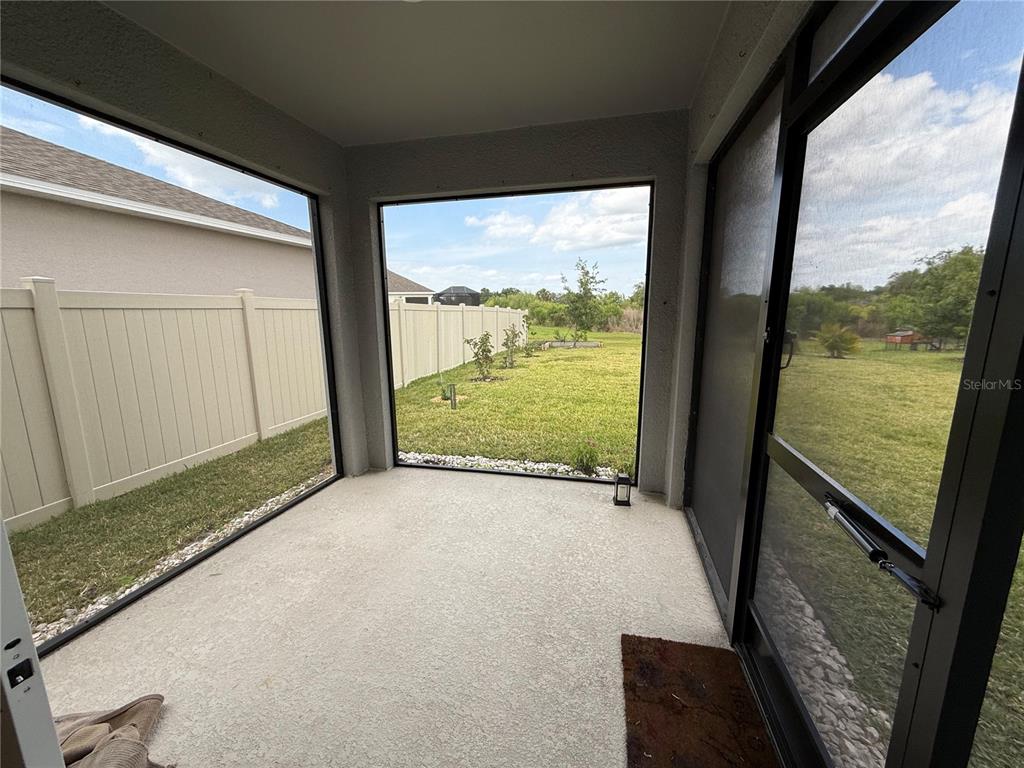 6431 Milestone Loop Palmetto, FL 34221 - Photo 21 of 28 a view of a room with a large window