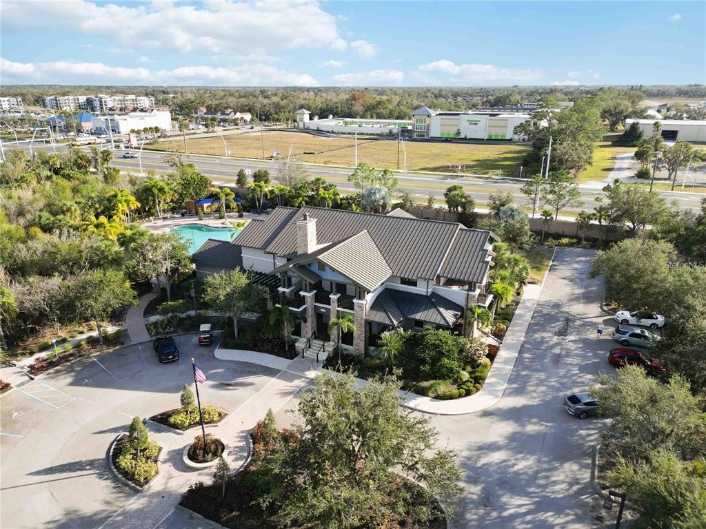 6431 Milestone Loop Palmetto, FL 34221 - Photo 24 of 28 an aerial view of a house with outdoor space and lake view in back