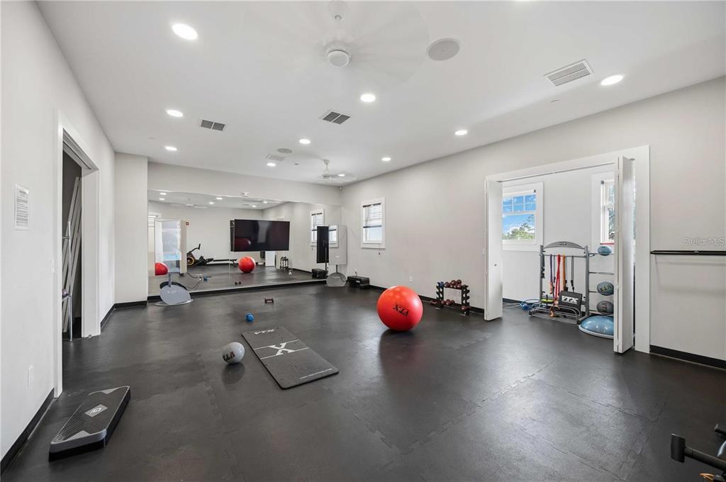 6431 Milestone Loop Palmetto, FL 34221 - Photo 26 of 28 a room with furniture and a flat screen tv