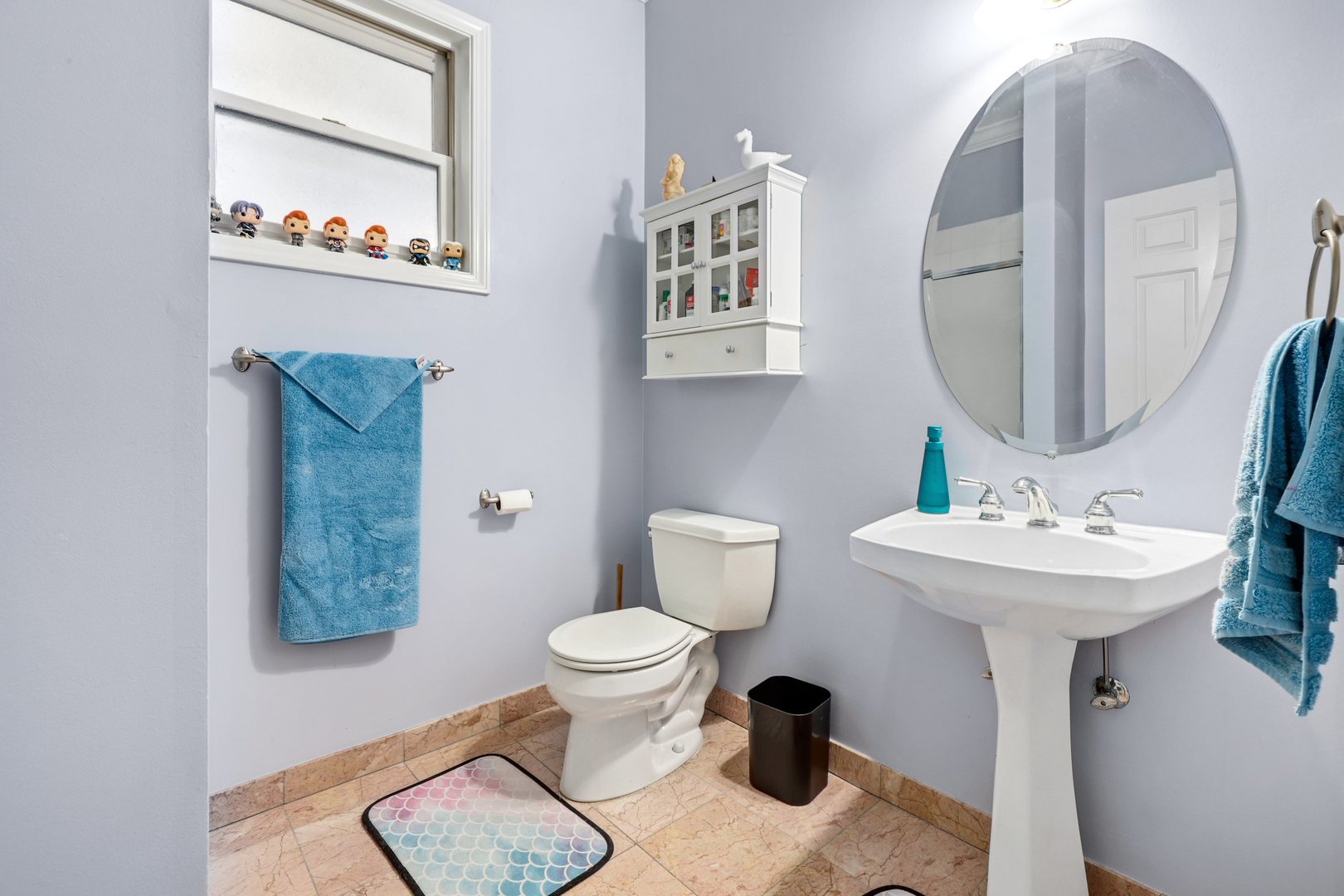 952 West Barry Avenue, Unit 1 Chicago, IL 60657 - Photo 7 of 11 a bathroom with a sink toilet and a mirror