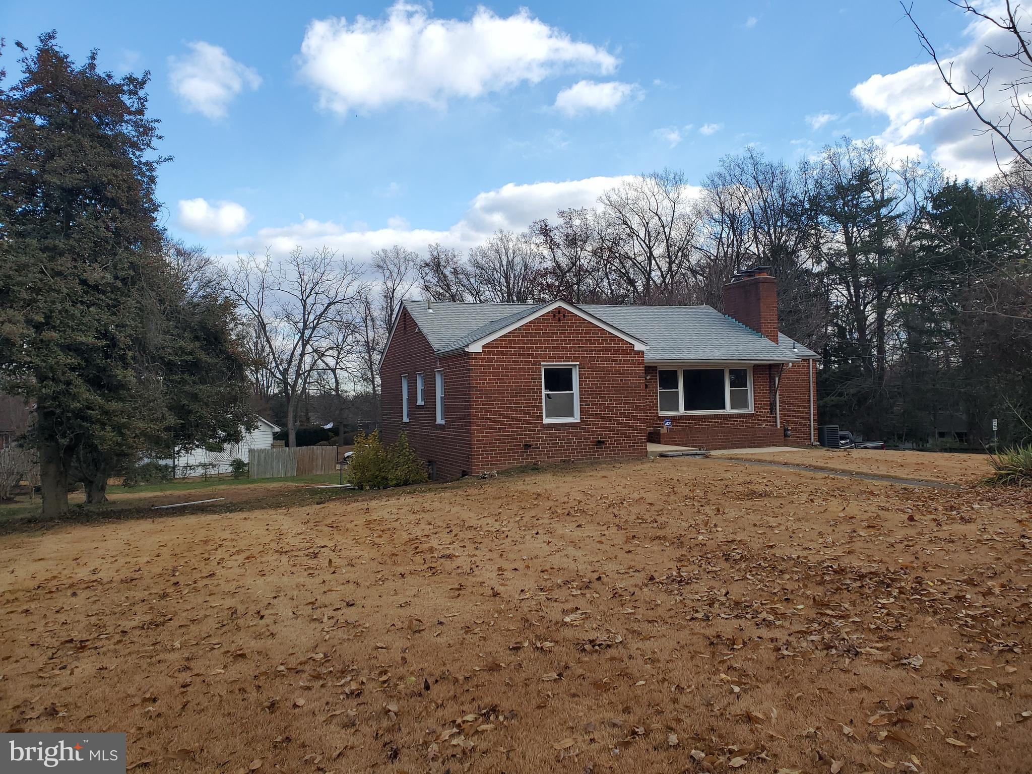 3311 Powder Mill Road Hyattsville, MD 20783 - Photo 2 of 33 a front view of a house with a yard and garage
