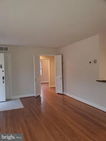 a kitchen with a stove and a refrigerator