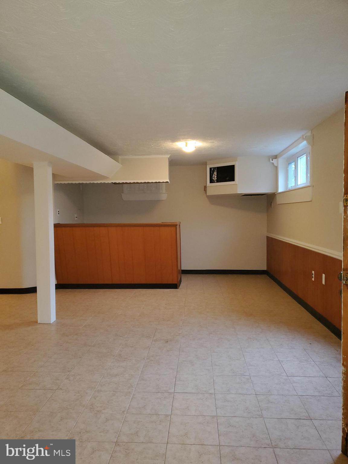 3311 Powder Mill Road Hyattsville, MD 20783 - Photo 29 of 33 a view of an empty room with windows