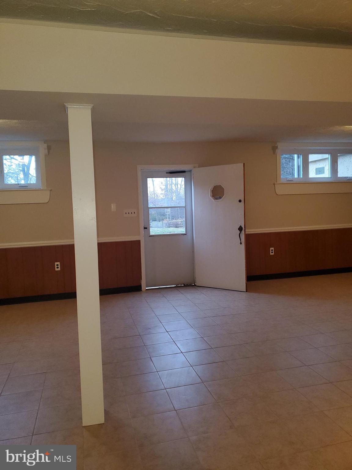 3311 Powder Mill Road Hyattsville, MD 20783 - Photo 30 of 33 a view of an empty room with a window