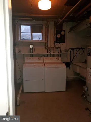 a bathroom with a toilet and a sink