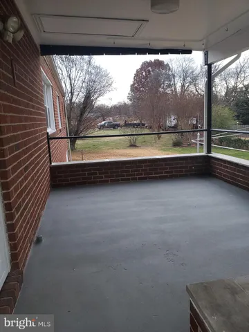 a view of street with large trees