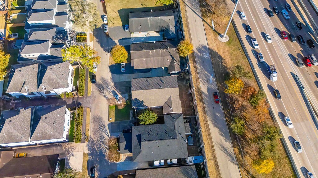 4723 Merwin Street Houston, TX 77027 - Photo 19 of 29 an aerial view of residential houses with outdoor space