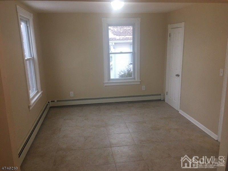 112 East Street Bound Brook, NJ 08805 - Photo 19 of 28 a view of a room that has a window in it